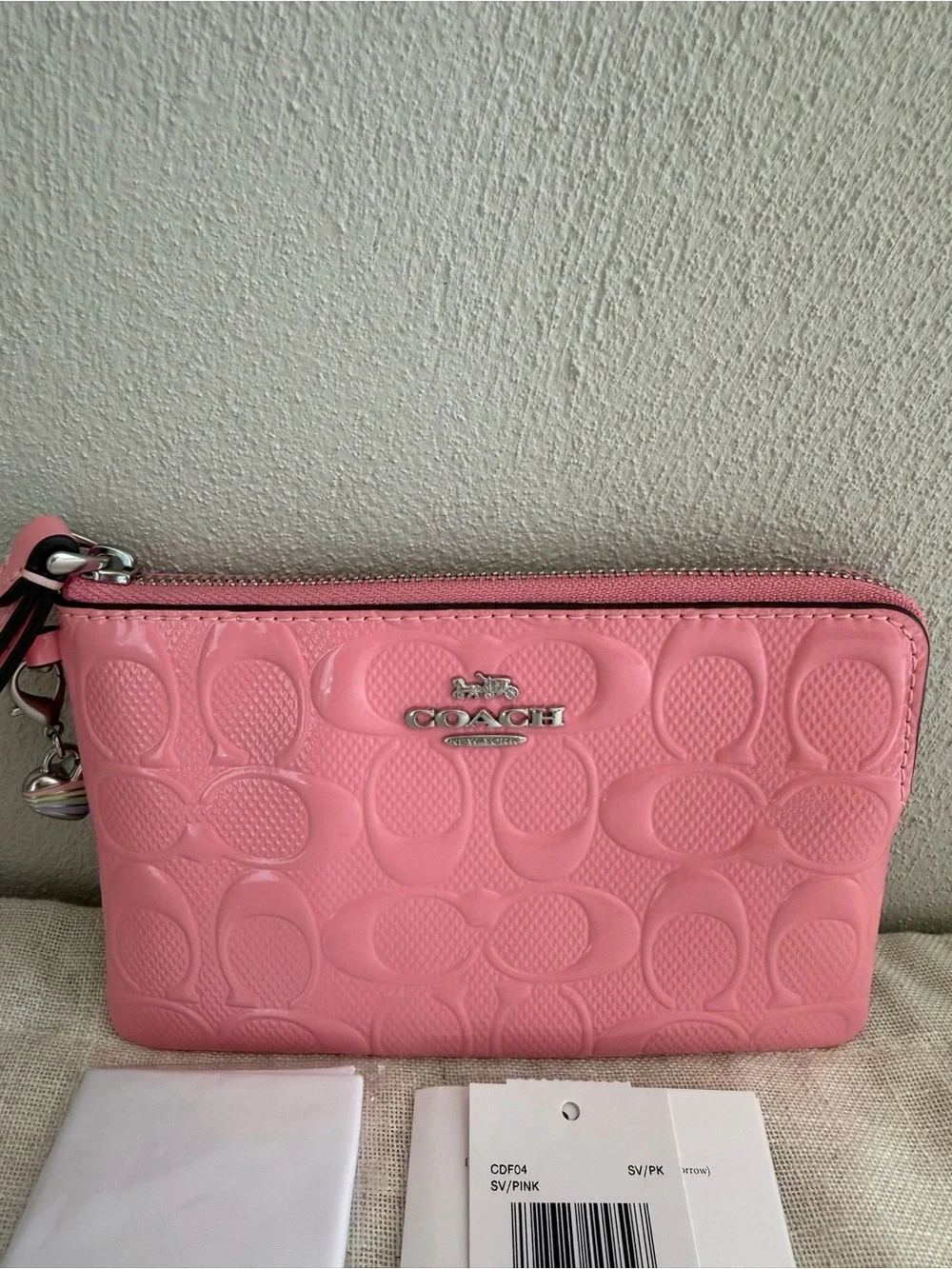 Coach Pink Corner Zip Signature Embossed Leather Wristlet with Heart Charm NWT